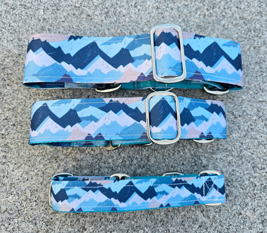 3 different sizes of the blue rocky mountain martingale dog collar by Soothe and Settle.