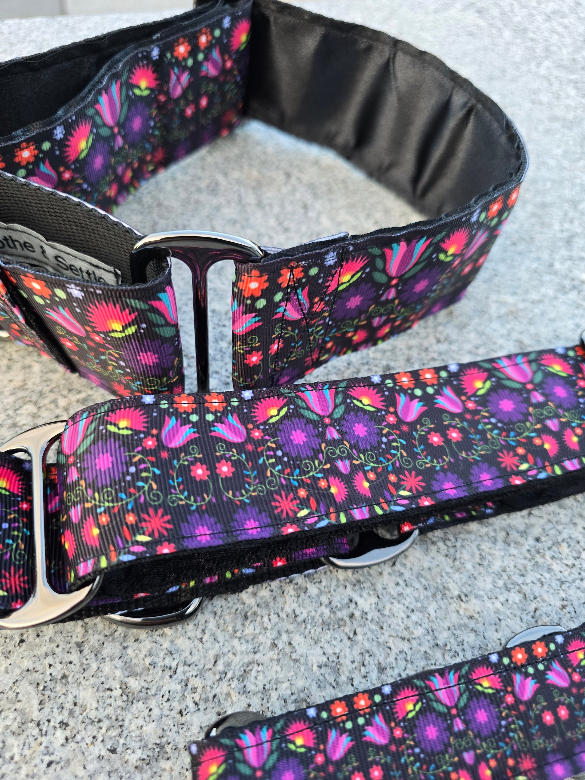 Two flower print martingale dog collars.